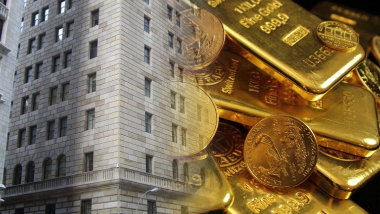 Fed e tensão no Oriente Médio: ouro cede com investidores cautelosos